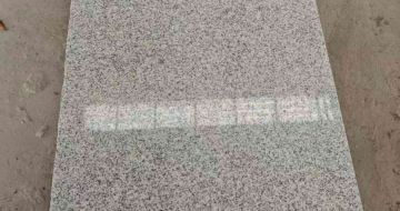 包头芝麻白光面毛板