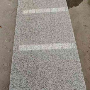 包头芝麻白光面毛板