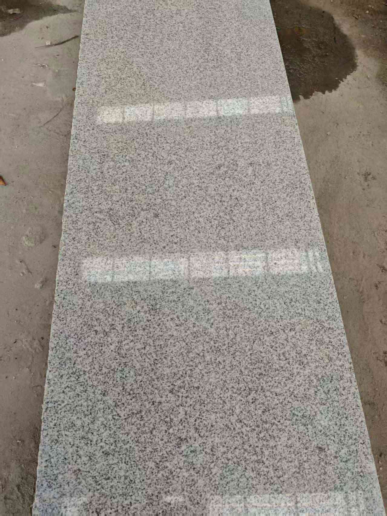 包头芝麻白光面毛板